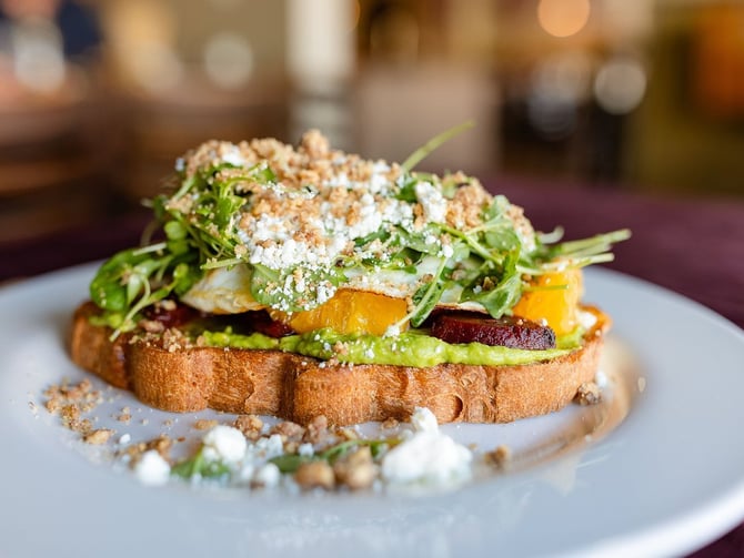 The Mission Cafe brunch dishes and coffee in a bright Mission Beach dining room