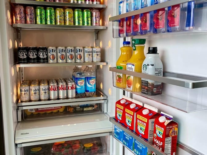 Refrigerator stocked with groceries
